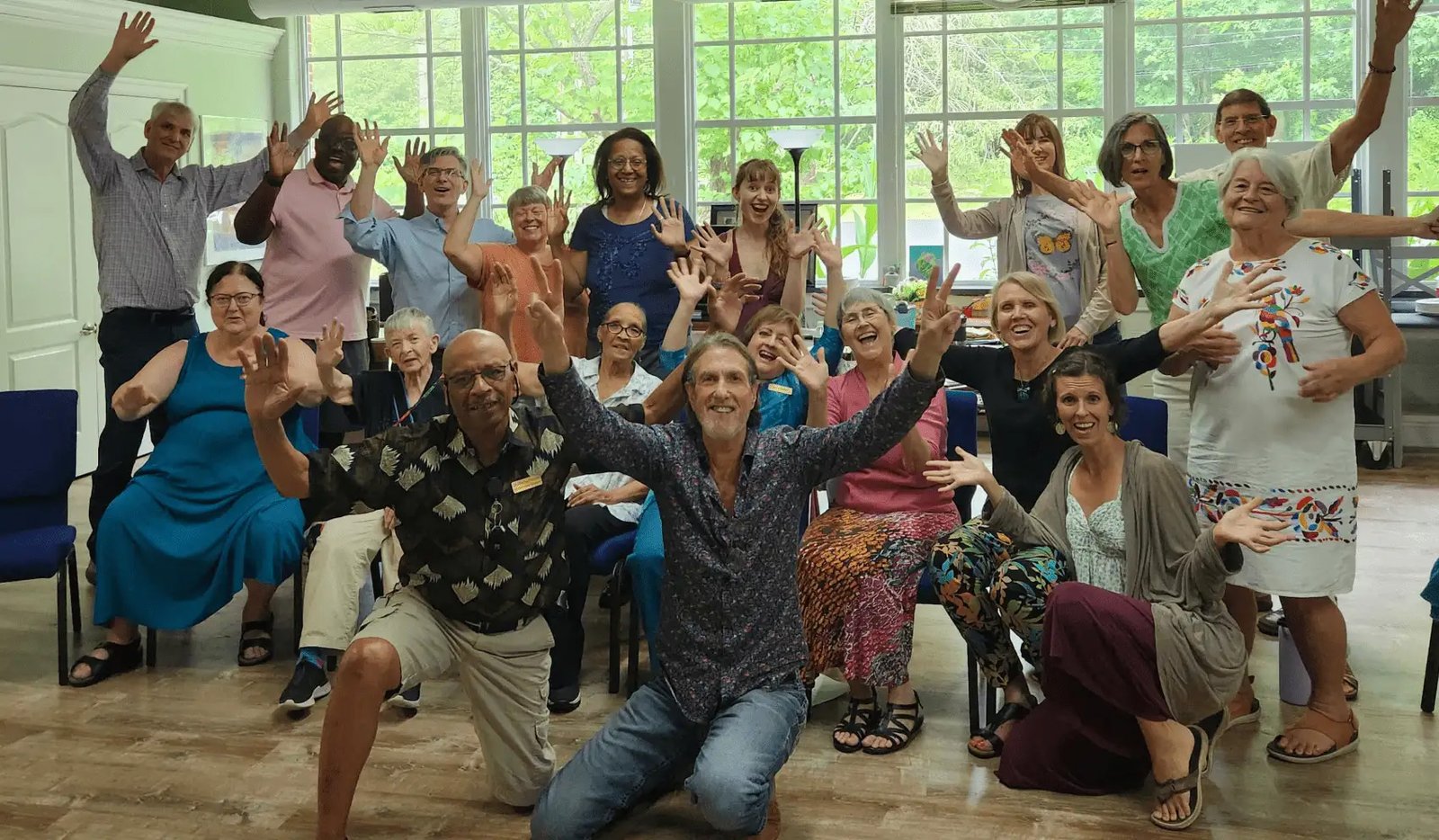 Welcoming Spiritual Center - crowd of our members with open arms